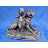 A VICTORIAN SPELTER GROUP OF A CHILD WITH DOG