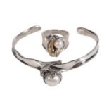 A HAND CRAFTED SILVER PEARL AND DIAMOND TORQUE BANGLE