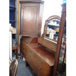 A GEORGE III OAK HANGING CORNER CUPBOARD