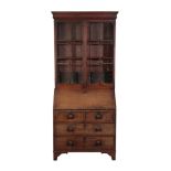 A GEORGE III MAHOGANY BUREAU BOOKCASE