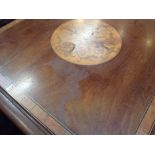 A EDWARDIAN MAHOGANY REVOLVING BOOKCASE