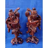 A PAIR OF CHINESE CARVED HARDWOOD FIGURES