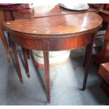 A GEORGE III MAHOGANY DEMI-LUNE TEA TABLE