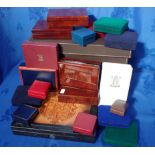 A COLLECTION OF EMPTY COIN PRESENTATION BOXES