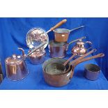A COLLECTION OF 19TH CENTURY AND LATER COPPER SAUCEPANS