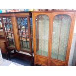 AN EARLY 20TH CENTURY FRENCH SATINWOOD DISPLAY CABINET