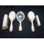 A SILVER MOUNTED DRESSING TABLE SET