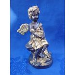 A REPRODUCTION BRONZE FIGURE OF A WINGED CHERUB