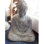 A RECONSTITUTED STONE GARDEN BUDDHA