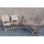 FOUR WOODEN FOLDING GARDEN CHAIRS