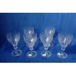 A SET OF SIX ENGRAVED WINE GLASSES