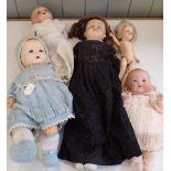 A COLLECTION OF BISQUE AND COMPOSITION HEAD DOLLS