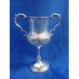 A SILVER PLATED TROPHY INSCRIBED 'D.J. PRESTON 1ST PRIZE BICYCLE RACE 1872'