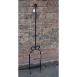 A COUNTRY HOUSE WROUGHT IRON BOOTSCRAPER