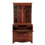 A REGENCY MAHOGANY SECRETAIRE CHEST OF DRAWERS