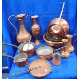 A COLLECTION OF COPPER PANS