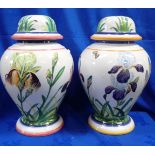 A PAIR OF LARGE ORNAMENTAL VASES AND COVERS