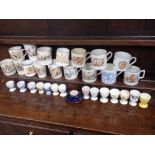 A COLLECTION OF COMMEMORATIVE MUGS