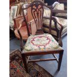 A GEORGE III STYLE ELBOW CHAIR