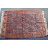 A BELUCH PRAYER RUG, BLUE AND RED