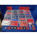 A COLLECTION COMMERATIVE COINS AND SOUVENIR SETS