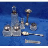 A PAIR OF SILVER TOPPED INKWELLS