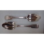 A PAIR OF SILVER SERVING SPOONS