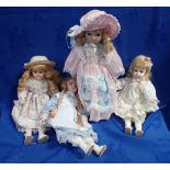 FOUR MODERN BISQUE DOLLS