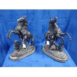 A PAIR OF PATINATED SPELTER 'MARLY' HORSES