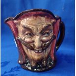 A ROYAL DOULTON 'MEPHISTOPHELES' JUG