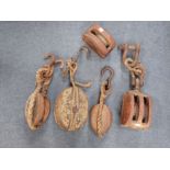 A COLLECTION OF MARITIME WOODEN PULLEYS