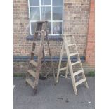 TWO VINTAGE WOODEN STEPLADDERS