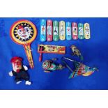 A TINPLATE CLOWN NOISEMAKER TOY