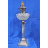 A VICTORIAN SILVER-PLATED CORINTHIAN COLUMN OIL LAMP