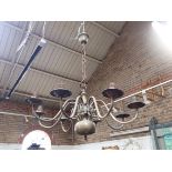 A BRASS EIGHT-BRANCH CHANDELIER