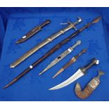 A COLLECTION OF MIDDLE EASTERN STYLE DAGGERS