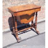 A VICTORIAN WALNUT WORKTABLE