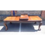 A LARGE EDWARDIAN CHIPPENDALE REVIVAL MAHOGANY DINING TABLE