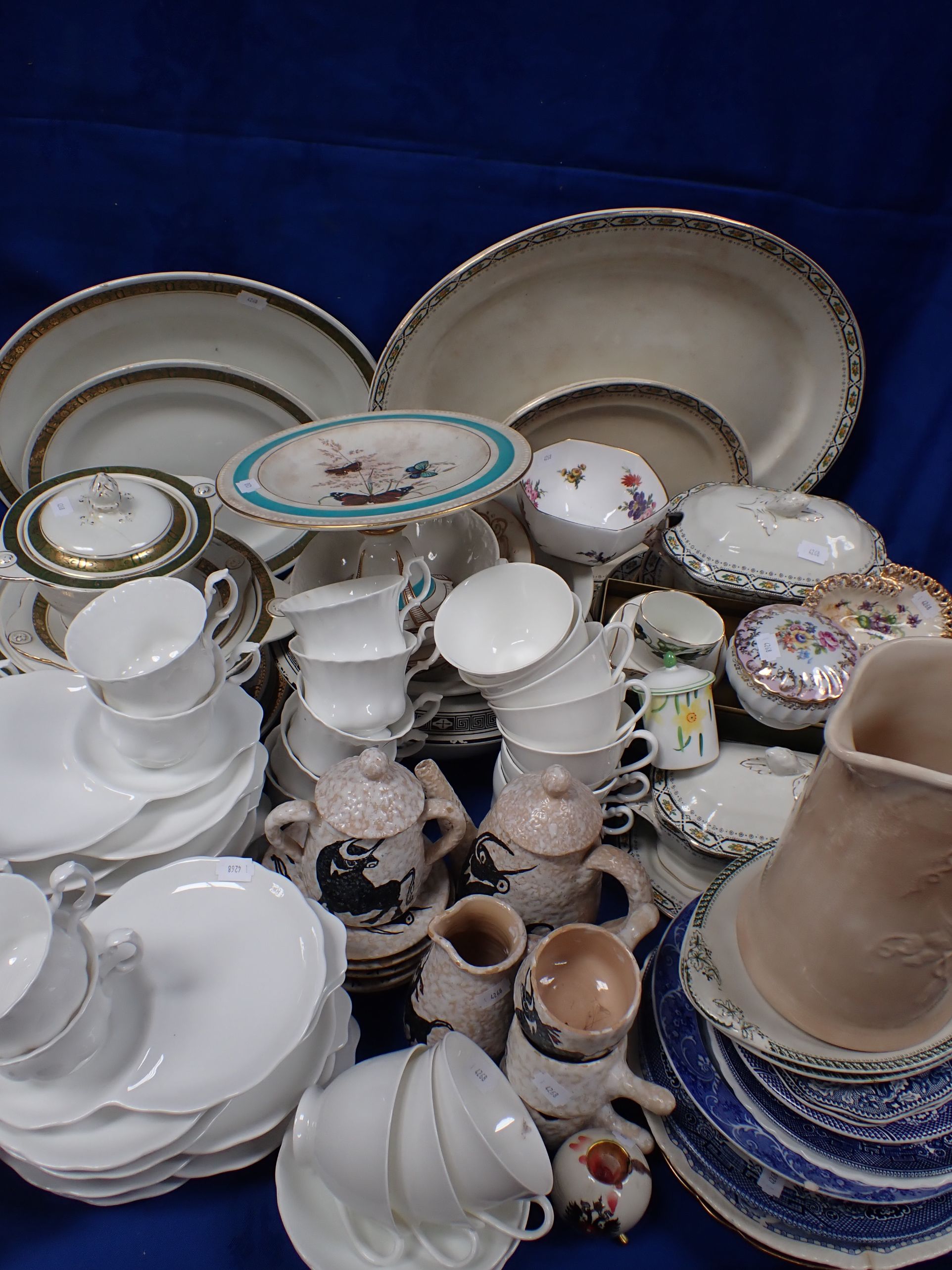 A QUANTITY OF WHITE CUPS AND SAUCERS/TEAPLATES