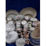 A QUANTITY OF WHITE CUPS AND SAUCERS/TEAPLATES