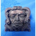 A CARVED WOOD GREEN MAN FIGURE