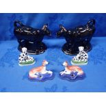 A PAIR OF PORCELANEOUS STAFFORDSHIRE STYLE GREYHOUND PENHOLDERS