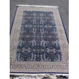 A MODERN HEREKE RUG