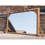 A GILT VICTORIAN FRAMED OVERMANTEL MIRROR