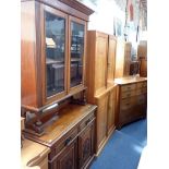 AN EDWARDIAN WALNUT BUFFET WITH GLAZED UPPER SECTION