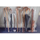 A COLLECTION OF WALKING STICKS, A SHOOTING STICK