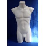 A MALE TORSO SHOP MANNEQUIN