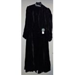 A VINTAGE BLACK VELVET EVENING COAT