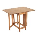 A LIMED OAK GATELEG TABLE, IN THE COTSWOLD STYLE