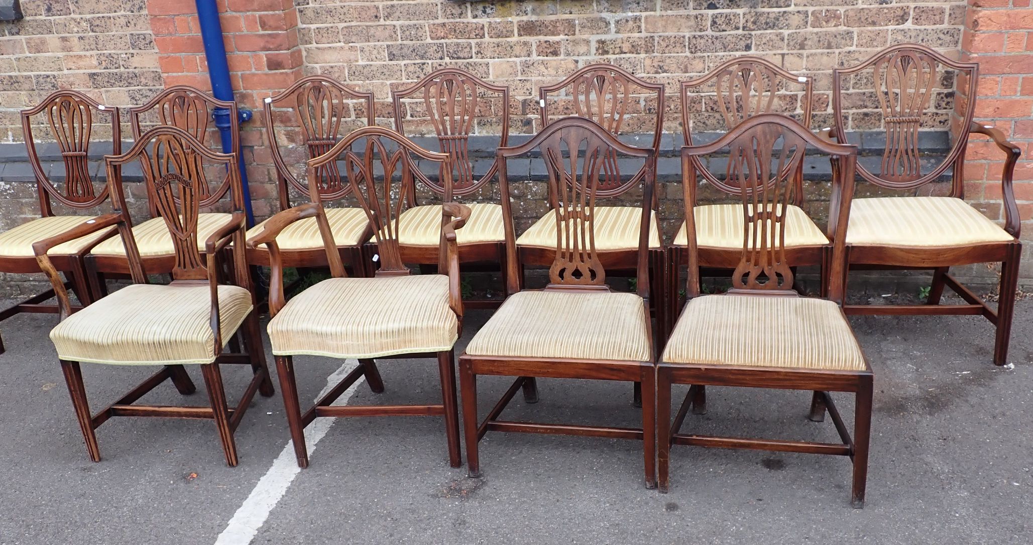 A PART SET OF HEPPLEWHITE STYLE MAHOGANY DINING CHAIRS